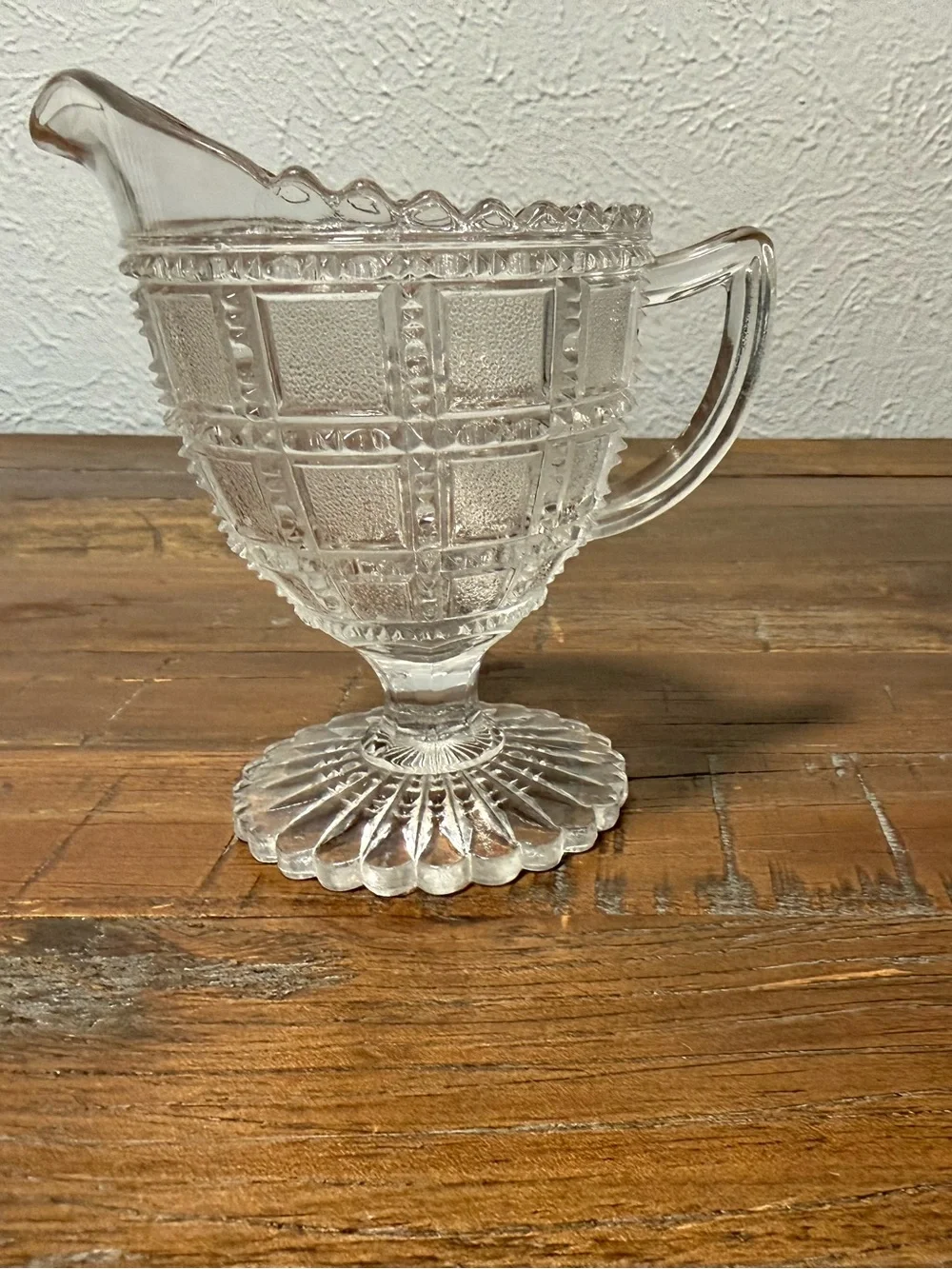 clear glass creamer is an Imperial Glass piece from the 1930s